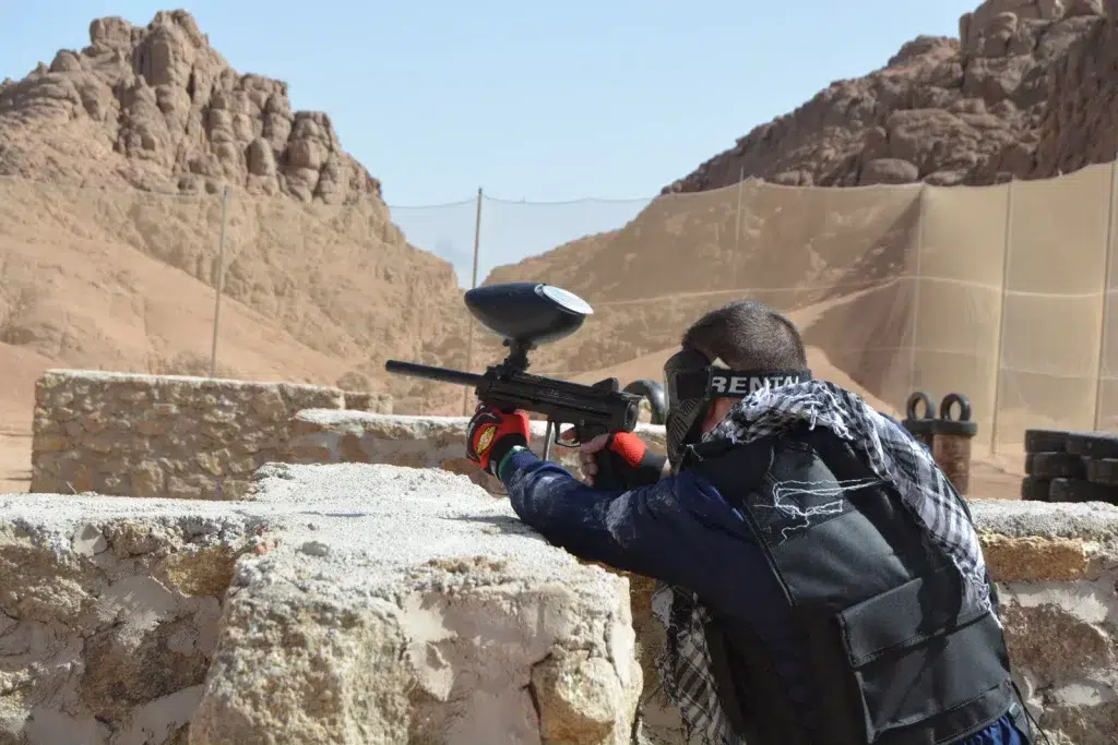 Tourists smiling after a paintball game in the rocky desert of Sharm El Sheikh