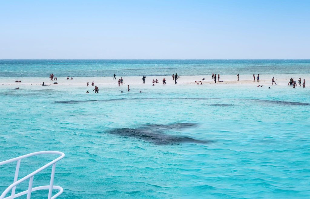 Aerial view of White Island sandbank surrounded by turquoise water at Ras Mohamed Sharm El Sheikh